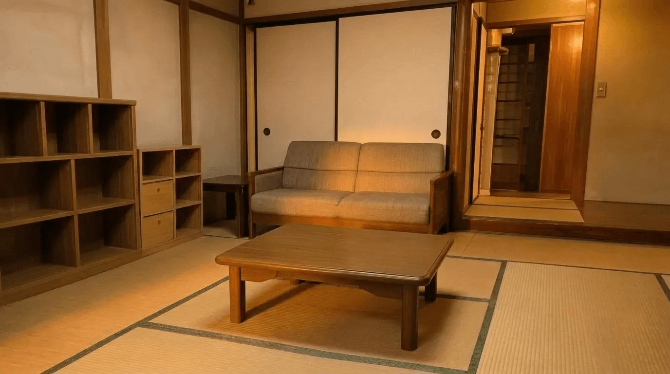 Empty Japanese living room with tatami mats, clean wooden shelves, and a sofa, demonstrating the results of ArchiX AI's automated decluttering feature